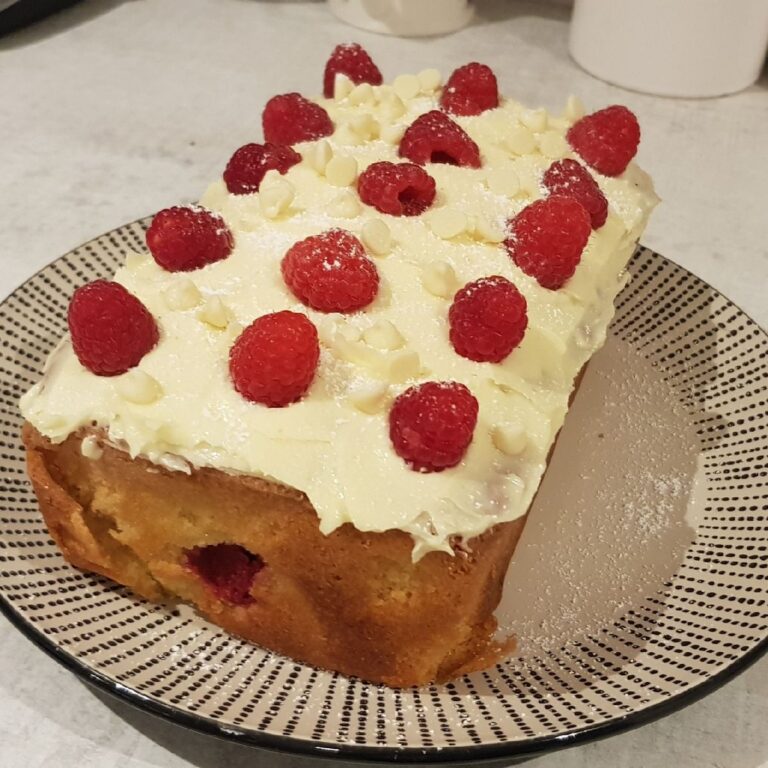 “Elegance in Every Slice: White Chocolate Raspberry Loaf Cake – A Confectionery Masterpiece!”